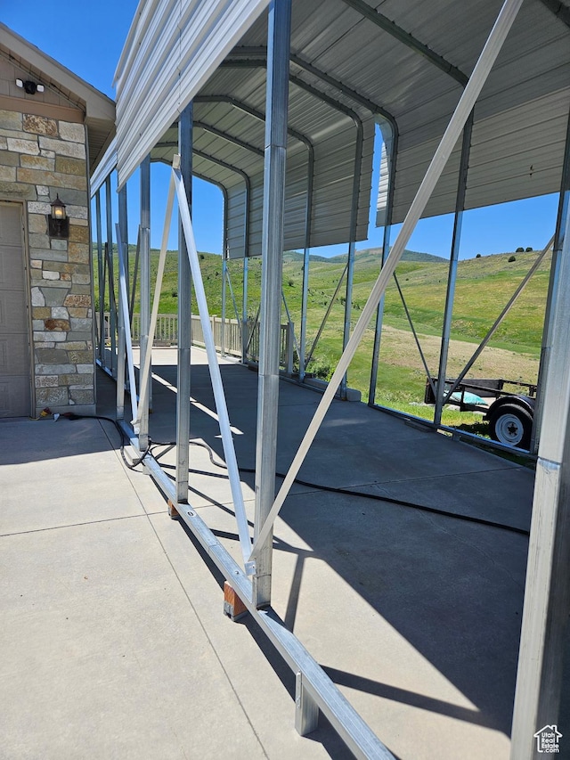 13695 Highlander Cir, Beaverdam, UT 84306 - view of patio / terrace featuring a detached carport