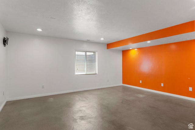 8793 S Mountain Vista Dr, West Jordan, UT 84081 - empty room featuring baseboards, concrete floors, recessed lighting, and a textured ceiling