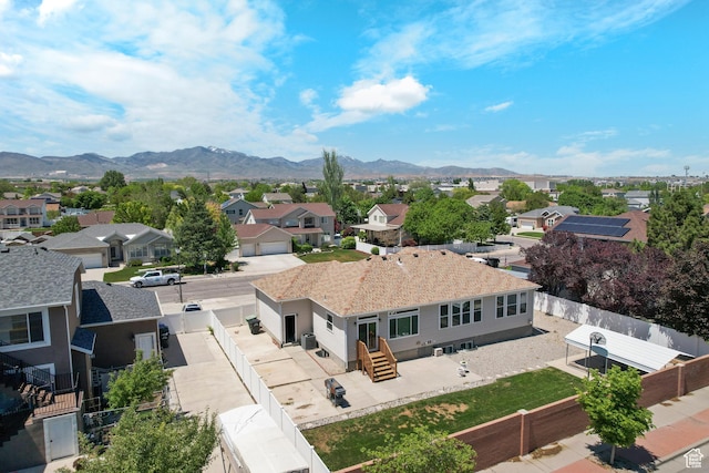 8793 S Mountain Vista Dr, West Jordan, UT 84081 - aerial view of residential area with a mountain backdrop