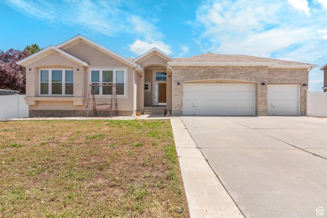 8793 S Mountain Vista Dr, West Jordan, UT 84081 - single story home featuring an attached garage, concrete driveway, and brick siding