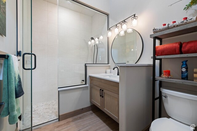 466 N Elk Dr, Brian Head, UT 84719 - full bath with vanity, wood finished floors, a stall shower, and toilet