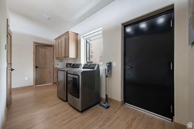 466 N Elk Dr, Brian Head, UT 84719 - washroom with light wood-type flooring, washer and dryer, cabinet space, and baseboards