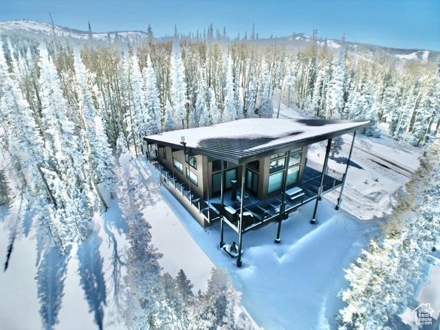 466 N Elk Dr, Brian Head, UT 84719 - snowy aerial view featuring a wooded view