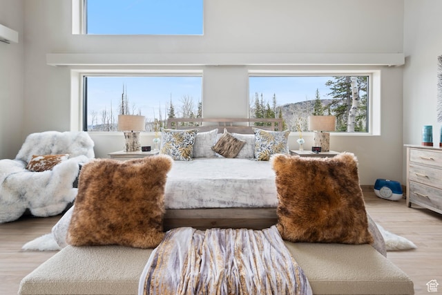 466 N Elk Dr, Brian Head, UT 84719 - bedroom with a towering ceiling and wood finished floors