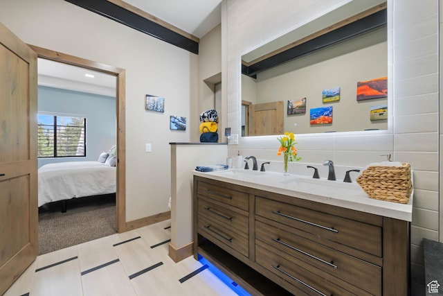 466 N Elk Dr, Brian Head, UT 84719 - full bath with double vanity, toilet, ensuite bath, and baseboards