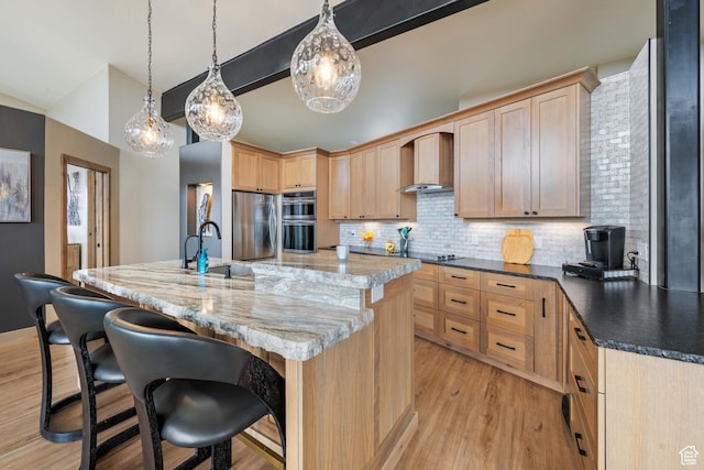 466 N Elk Dr, Brian Head, UT 84719 - kitchen featuring wall chimney range hood, light brown cabinets, appliances with stainless steel finishes, and light wood-style flooring