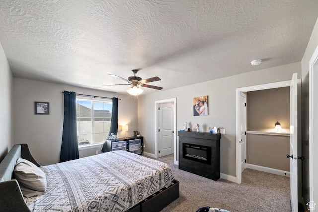 404 W 1325 N Unit L5, Cedar City, UT 84721 - carpeted bedroom featuring a textured ceiling, a ceiling fan, and baseboards