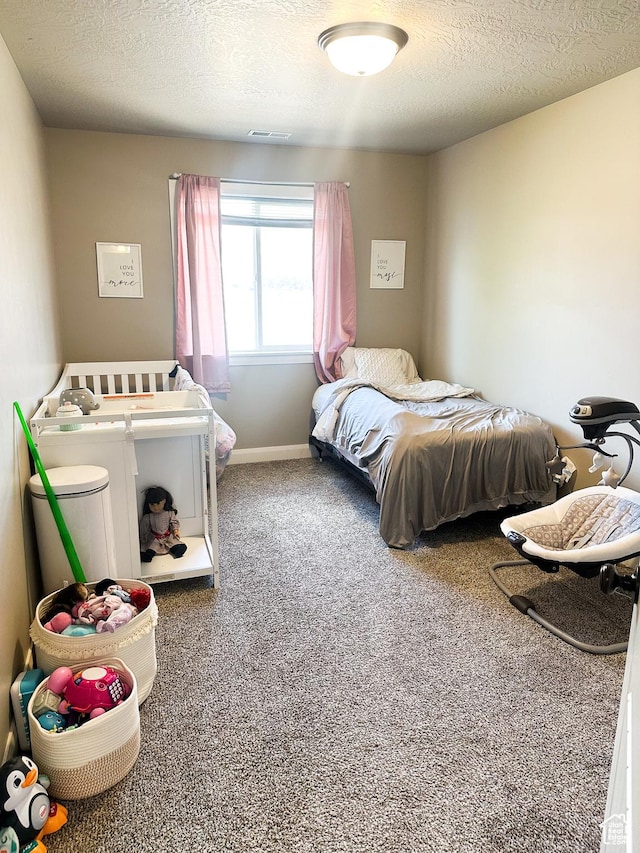 404 W 1325 N Unit L5, Cedar City, UT 84721 - carpeted bedroom with a textured ceiling