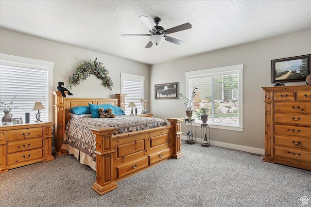 4548 N Sheep Creek Dr, Eden, UT 84310 - bedroom featuring light carpet, baseboards, a ceiling fan, and a textured ceiling