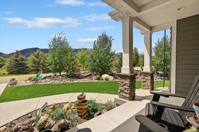 4548 N Sheep Creek Dr, Eden, UT 84310 - porch with a mountain view and a yard