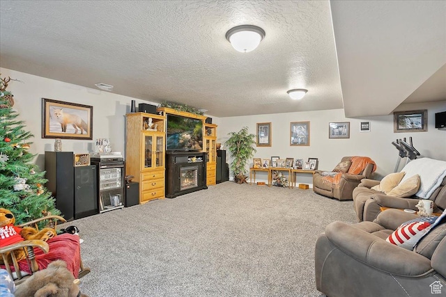 4548 N Sheep Creek Dr, Eden, UT 84310 - carpeted living room with a textured ceiling and a fireplace