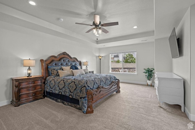 1407 W Fort Rock Dr, Saratoga Springs, UT 84045 - carpeted bedroom with a tray ceiling, baseboards, recessed lighting, and a ceiling fan