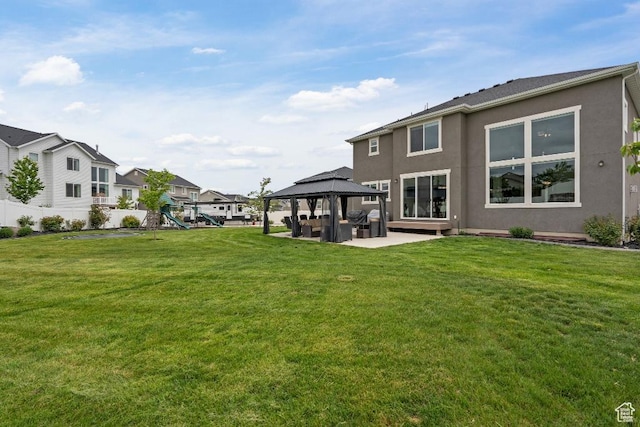 1407 W Fort Rock Dr, Saratoga Springs, UT 84045 - view of yard featuring a gazebo, a patio area, a residential view, and a playground