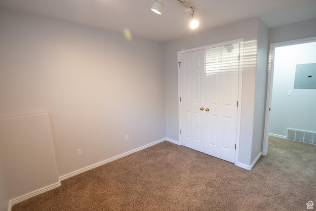 509 N Belmont Pl E Unit 171, Provo, UT 84606 - unfurnished bedroom featuring electric panel, carpet flooring, a closet, and baseboards