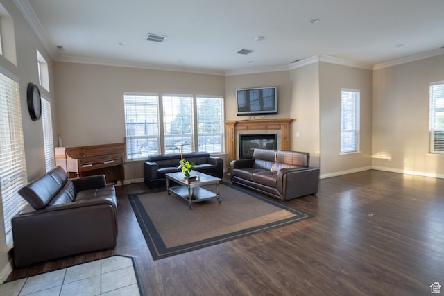 509 N Belmont Pl E Unit 171, Provo, UT 84606 - living area with wood finished floors, a glass covered fireplace, crown molding, and baseboards