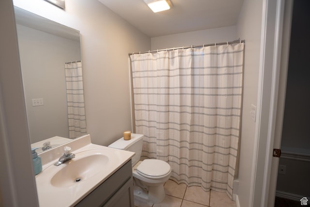 509 N Belmont Pl E Unit 171, Provo, UT 84606 - full bath featuring toilet, vanity, tile patterned flooring, and a shower with shower curtain