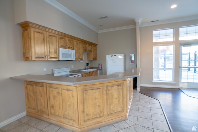 509 N Belmont Pl E Unit 171, Provo, UT 84606 - kitchen with white appliances, crown molding, baseboards, light tile patterned flooring, and a peninsula