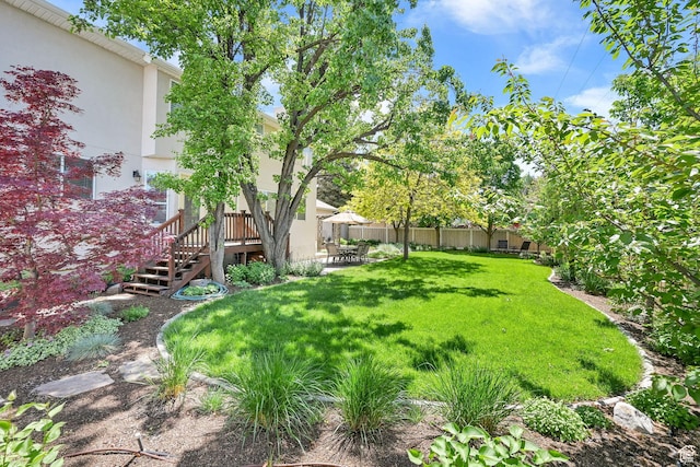 6782 S Courtland Ave, Cottonwood Heights, UT 84121 - view of yard featuring a patio, stairs, and a deck