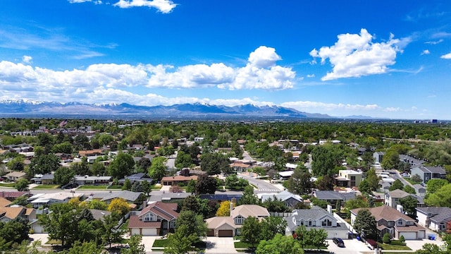 6782 S Courtland Ave, Cottonwood Heights, UT 84121 - aerial perspective of suburban area featuring mountains