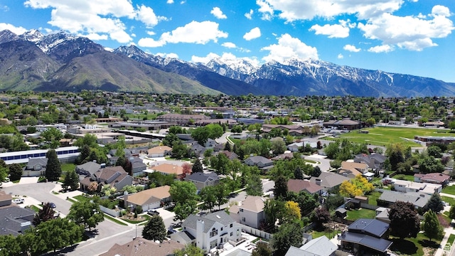6782 S Courtland Ave, Cottonwood Heights, UT 84121 - aerial perspective of suburban area featuring a mountain backdrop