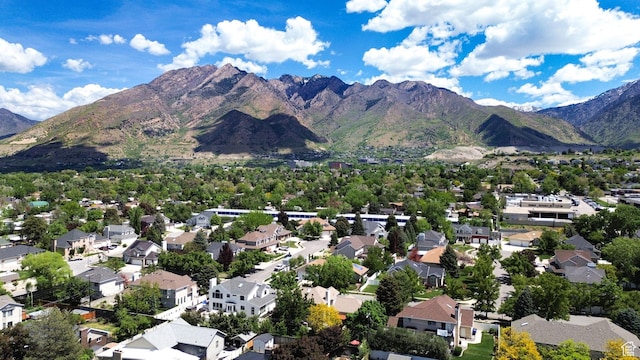 6782 S Courtland Ave, Cottonwood Heights, UT 84121 - aerial overview of property's location featuring mountains and nearby suburban area