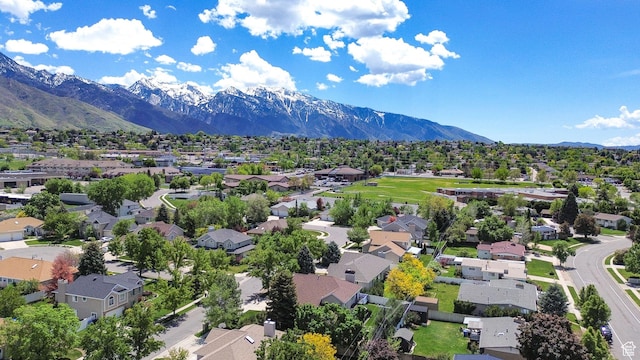 6782 S Courtland Ave, Cottonwood Heights, UT 84121 - aerial perspective of suburban area with a mountain backdrop