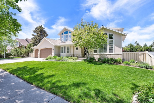 6782 S Courtland Ave, Cottonwood Heights, UT 84121 - view of front of home with stone siding, stucco siding, an attached garage, and driveway
