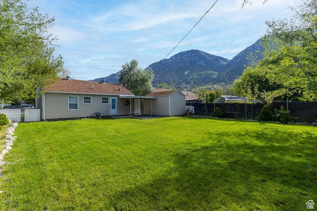 1006 E 300 N, Provo, UT 84606 - back of property featuring a mountain view and a patio area