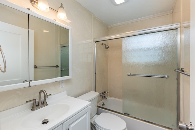 1006 E 300 N, Provo, UT 84606 - bathroom featuring toilet, vanity, and shower / bath combination with glass door