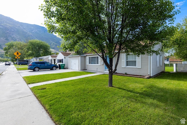 1006 E 300 N, Provo, UT 84606 - view of front of house featuring a mountain view, driveway, and a garage