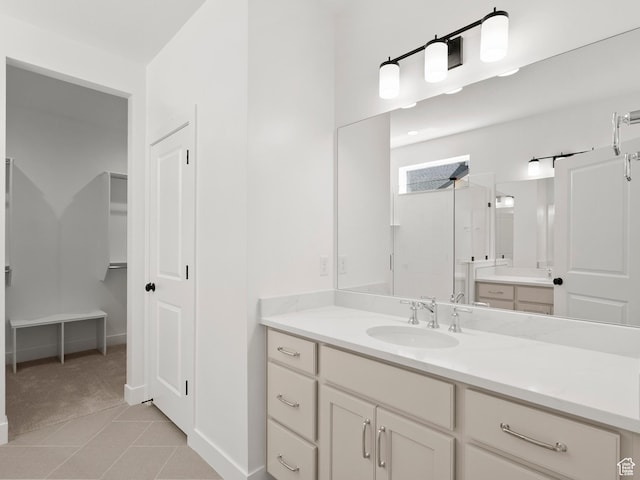 1002 E 400 N Unit 3, Salem, UT 84653 - bathroom featuring vanity, walk in shower, tile patterned flooring, and a walk in closet