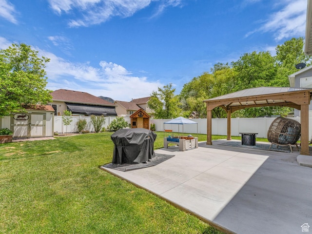 5472 Ardennes Way, Stansbury Park, UT 84074 - view of yard featuring a gazebo, a patio, and a storage shed