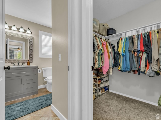 5472 Ardennes Way, Stansbury Park, UT 84074 - walk in closet with a sink