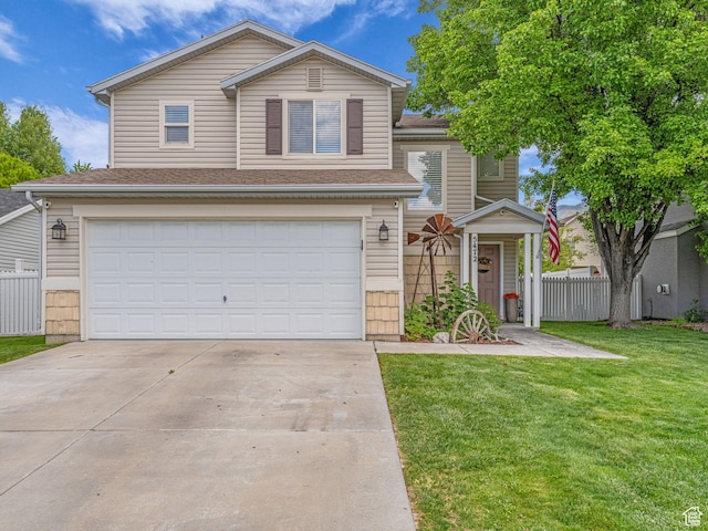 5472 Ardennes Way, Stansbury Park, UT 84074 - traditional-style home with a garage, concrete driveway, and roof with shingles
