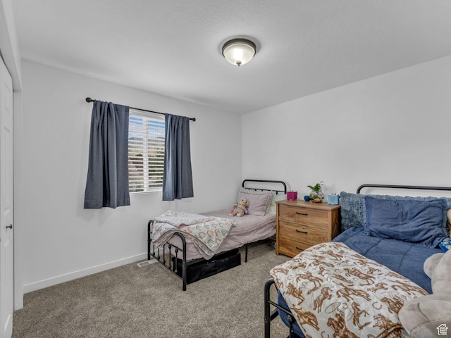 5472 Ardennes Way, Stansbury Park, UT 84074 - bedroom featuring carpet floors and baseboards