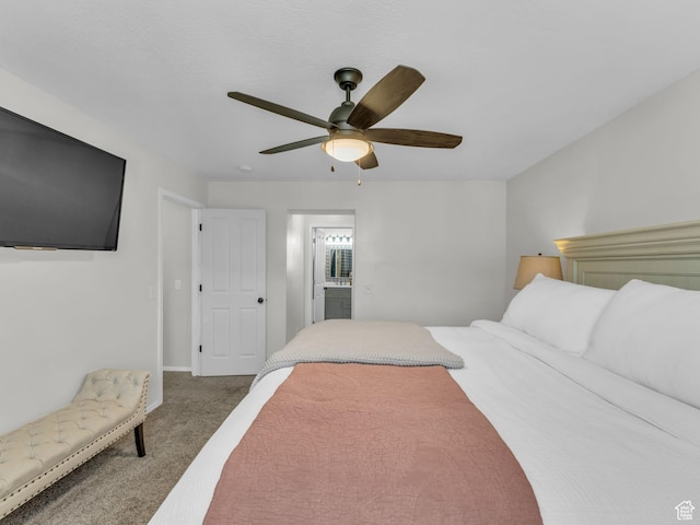 5472 Ardennes Way, Stansbury Park, UT 84074 - carpeted bedroom featuring a ceiling fan, ensuite bathroom, and baseboards