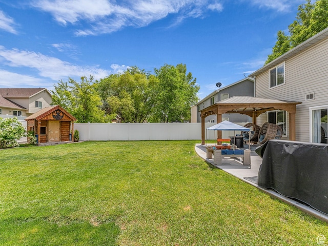 5472 Ardennes Way, Stansbury Park, UT 84074 - view of yard featuring a gazebo, an outdoor hangout area, and a patio area