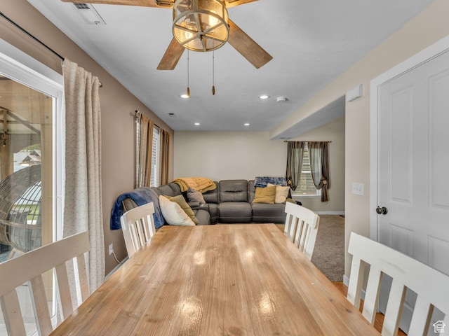5472 Ardennes Way, Stansbury Park, UT 84074 - dining room featuring a ceiling fan, plenty of natural light, baseboards, recessed lighting, and wood finished floors
