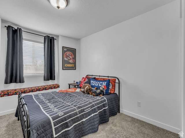 5472 Ardennes Way, Stansbury Park, UT 84074 - carpeted bedroom with baseboards