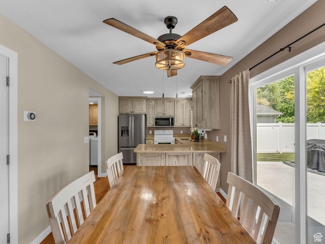 5472 Ardennes Way, Stansbury Park, UT 84074 - dining space featuring baseboards and a ceiling fan