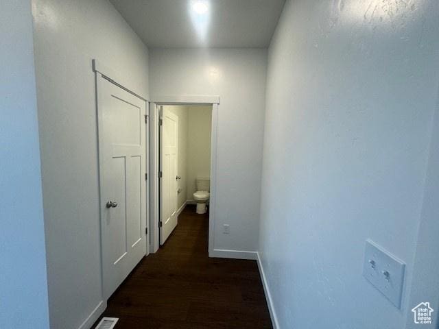 436 W Sapphire Dr Unit 7013, Tooele, UT 84074 - corridor featuring baseboards and dark wood-style floors