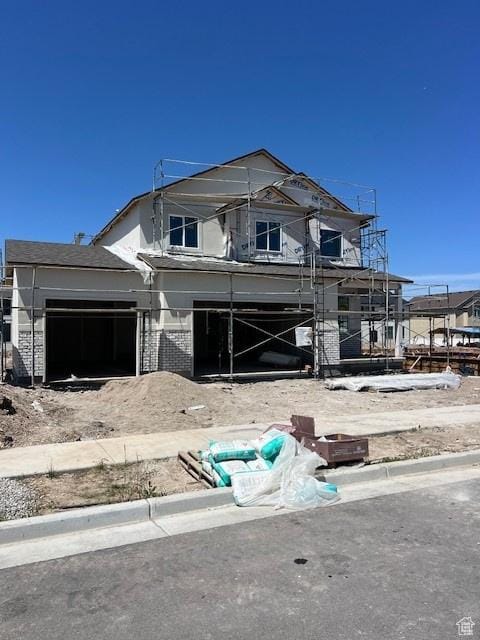 436 W Sapphire Dr Unit 7013, Tooele, UT 84074 - unfinished property with brick siding