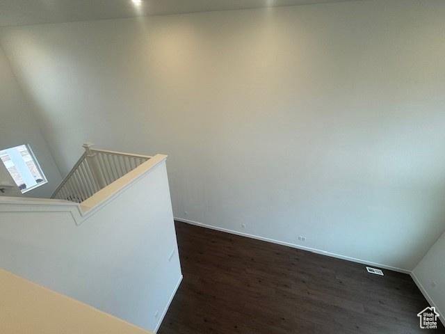 436 W Sapphire Dr Unit 7013, Tooele, UT 84074 - unfurnished room featuring dark wood finished floors and baseboards