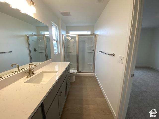 436 W Sapphire Dr Unit 7013, Tooele, UT 84074 - full bath featuring vanity, a stall shower, toilet, and baseboards