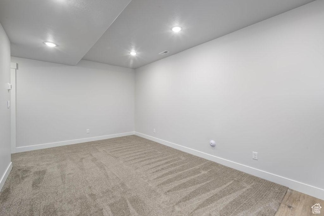 7936 N Bristlecone Rd, Eagle Mountain, UT 84005 - carpeted spare room featuring baseboards and recessed lighting