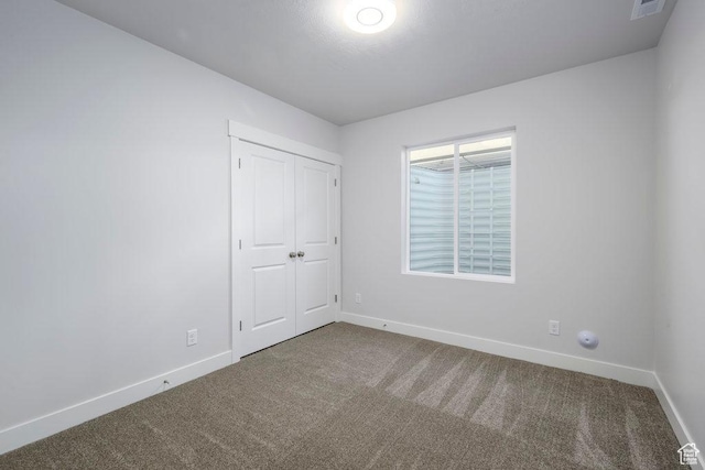 7936 N Bristlecone Rd, Eagle Mountain, UT 84005 - unfurnished bedroom featuring carpet flooring and baseboards