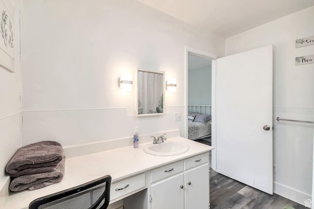 185 N 200 W, Delta, UT 84624 - ensuite bathroom featuring vanity and wood finished floors