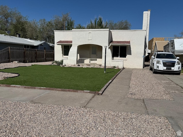 185 N 200 W, Delta, UT 84624 - view of front of home with covered porch and stucco siding