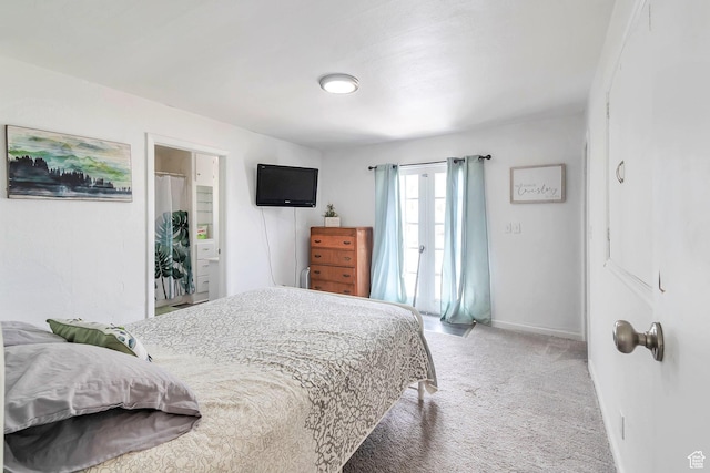 185 N 200 W, Delta, UT 84624 - bedroom featuring light carpet, baseboards, and connected bathroom