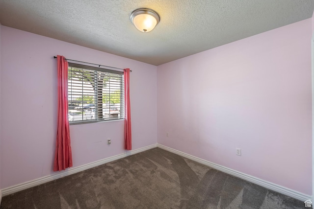 191 E Spencer Peak Way Unit I2, Draper, UT 84020 - unfurnished room featuring dark colored carpet, a textured ceiling, and baseboards